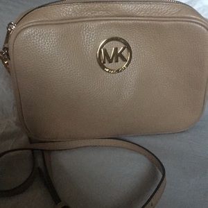 Michael Kors leather crossbody purse.